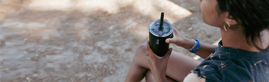 Person holding a MiiR Straw Tumbler