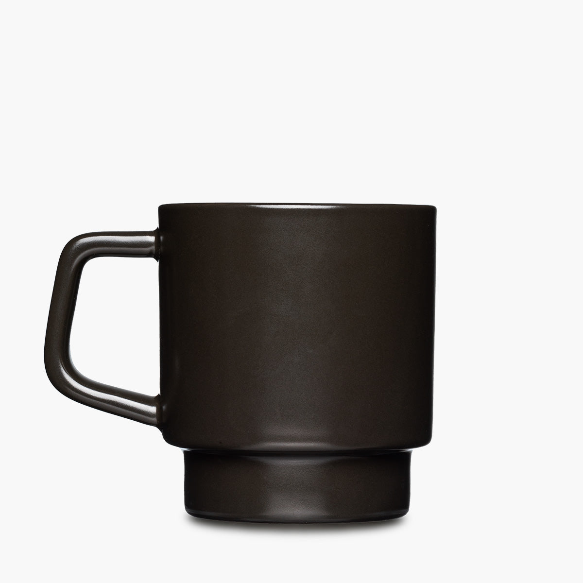 A matte black ceramic mug with a thick, integrated handle and a matching wide base.