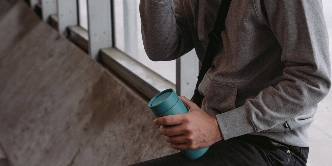 Person wearing a grey MiiR sweatshirt