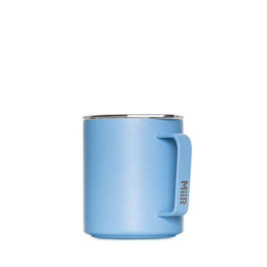 Blue insulated mug with handle on a white background